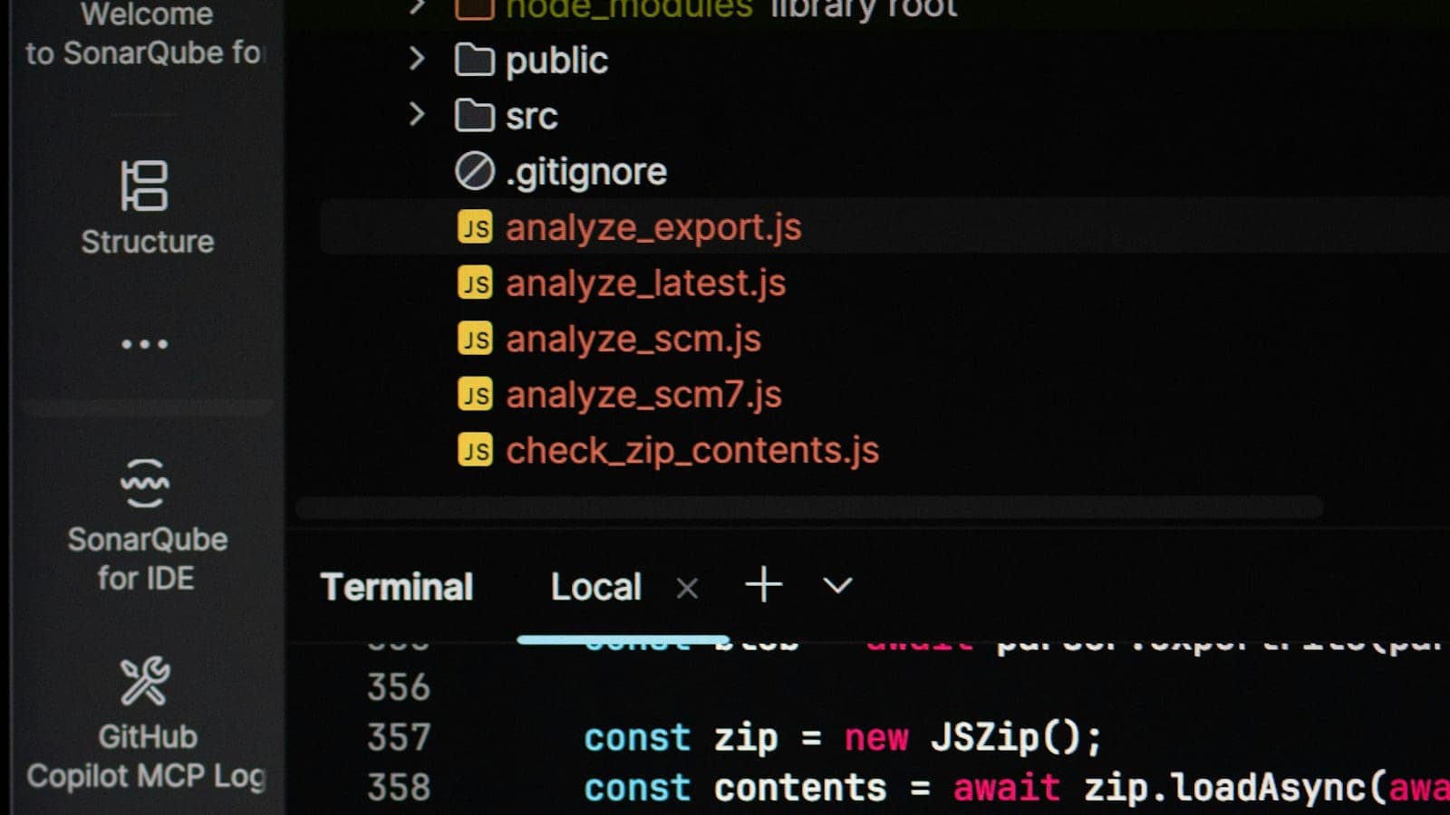 Placeholder: source code on a dark screen